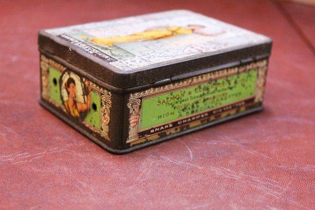 Snake Charmer Cigarette Tin | XXXX Antique Complex