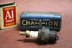 Early Champion Spark Plug in Original Advertising Tin.